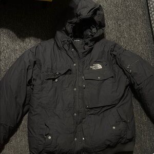 The North Face Black Puffer Jacket Insulated and Versatile